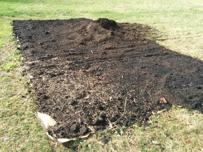 new squash garden gets layer of compost